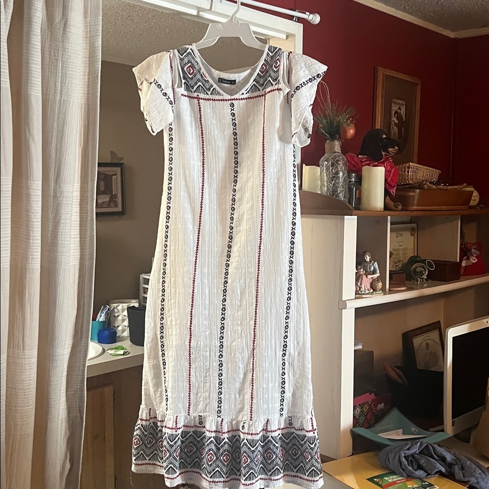 SHEIN White Garment with Red and Black Accents